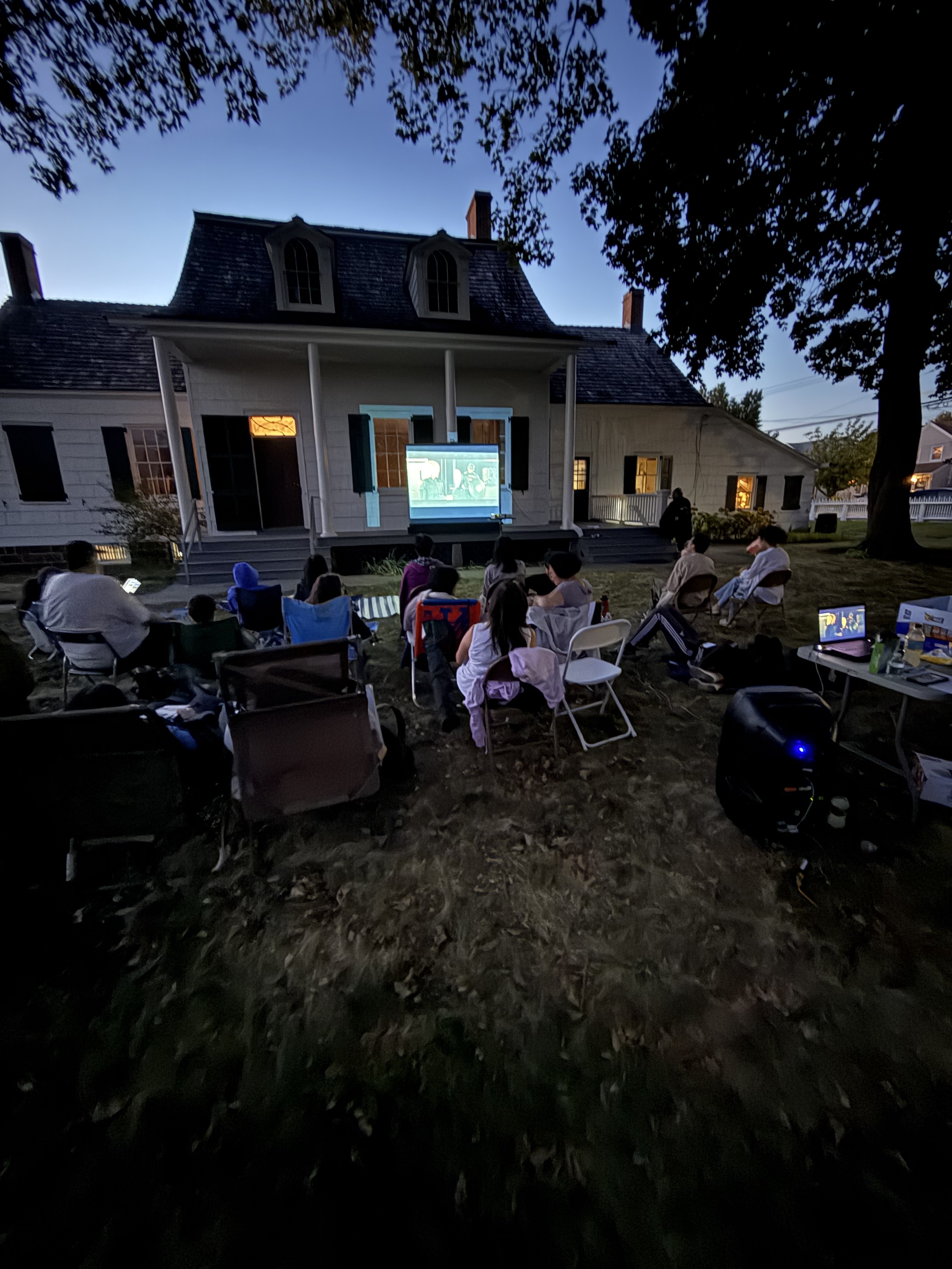 Outdoor movie night on the lawn at the historic Hendrick I. Lott House